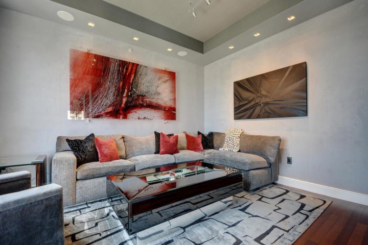 A living room with a couch and a table