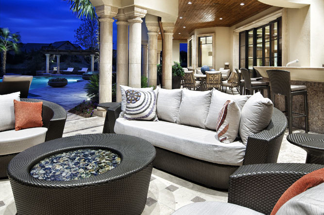 A living room with couches and tables in it