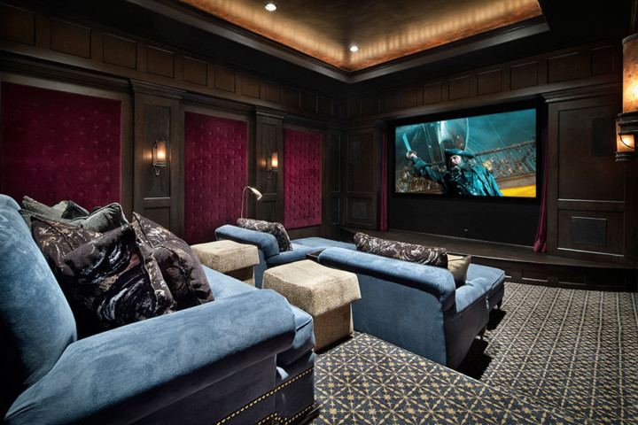 A room with couches and a television in it