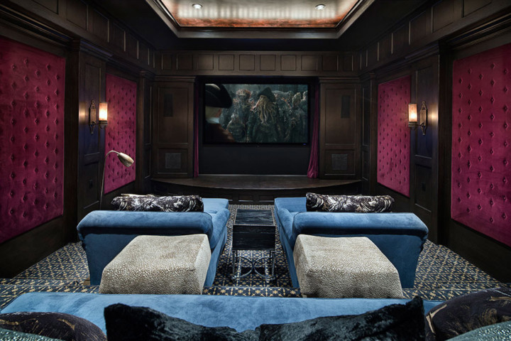 A room with two couches and a television.