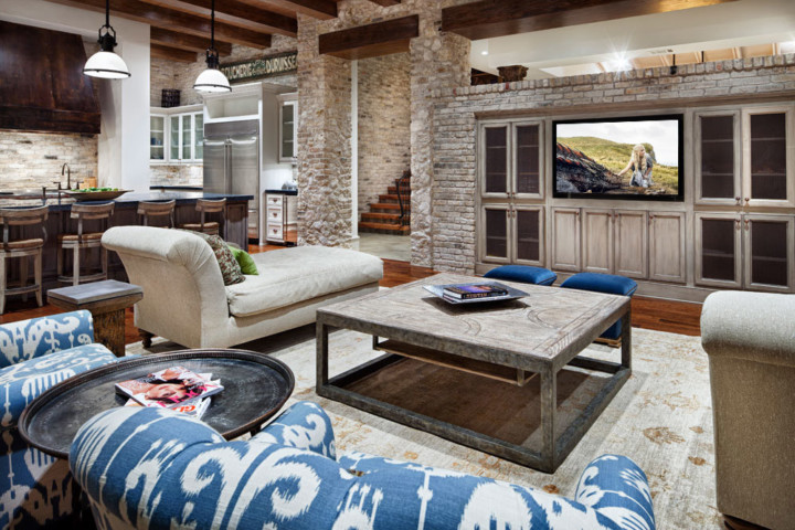 A living room with couches and tables in it