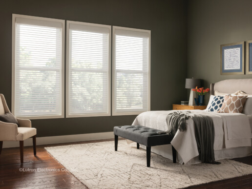 Three bedroom windows featuring Lutron Motorized blinds. 