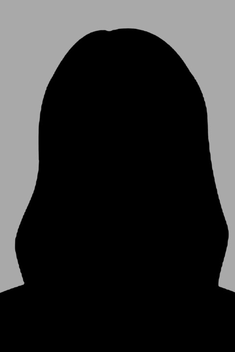 A person 's silhouette is shown in front of a gray background.